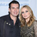 Jorge Salinas cuida a sus gemelos mientras Elizabeth Álvarez trabaja. Foto: Getty Images