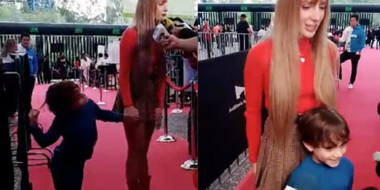 Hijo de Julián Figueroa cuenta a quién le dedica sus medallas de natación; se ve feliz en una alfombra roja